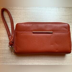 NWT Mundi Rust Clutch Wristlet
